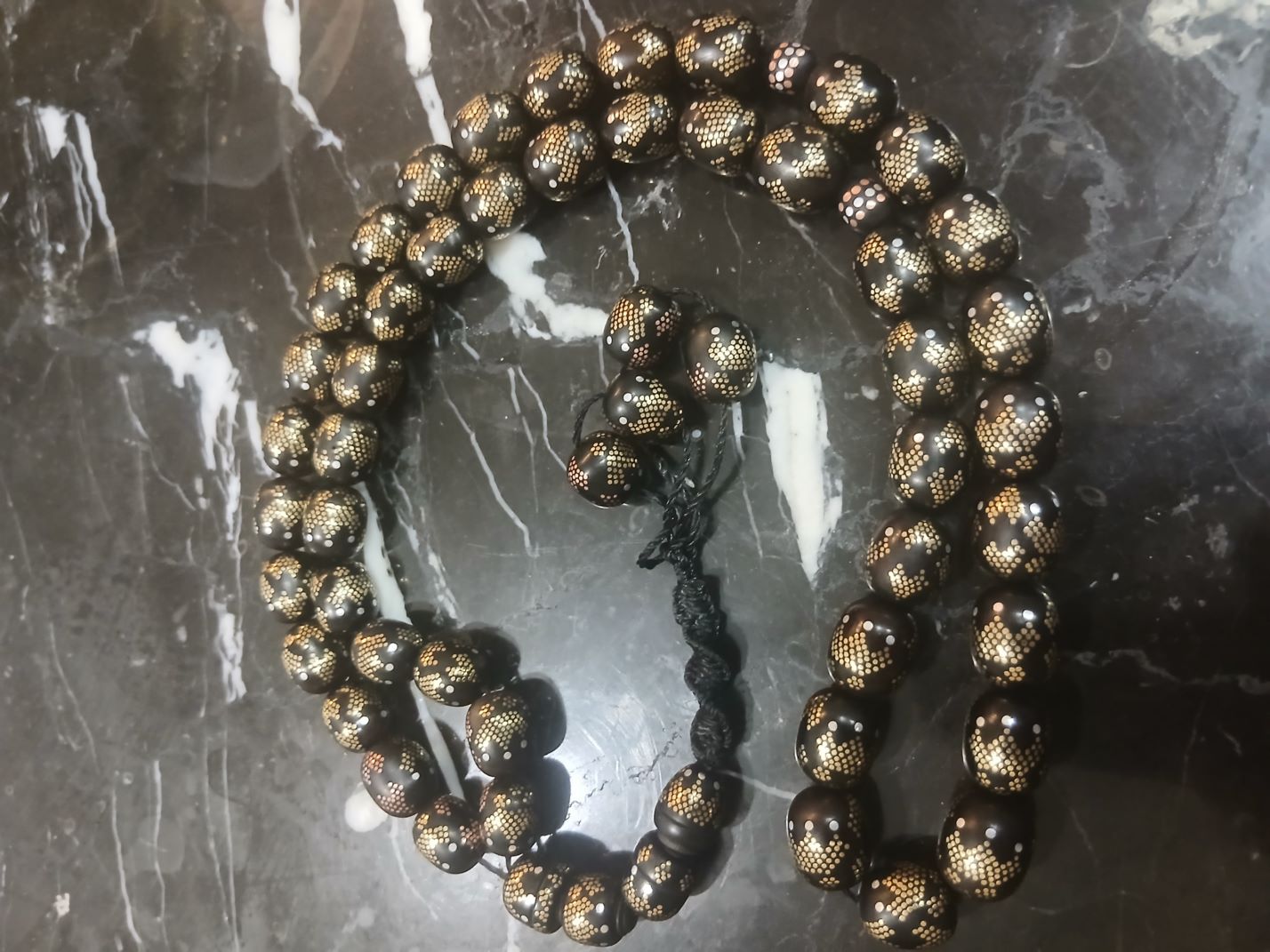 تسبیح مسکوبی برنج کوبی شده کار دست 